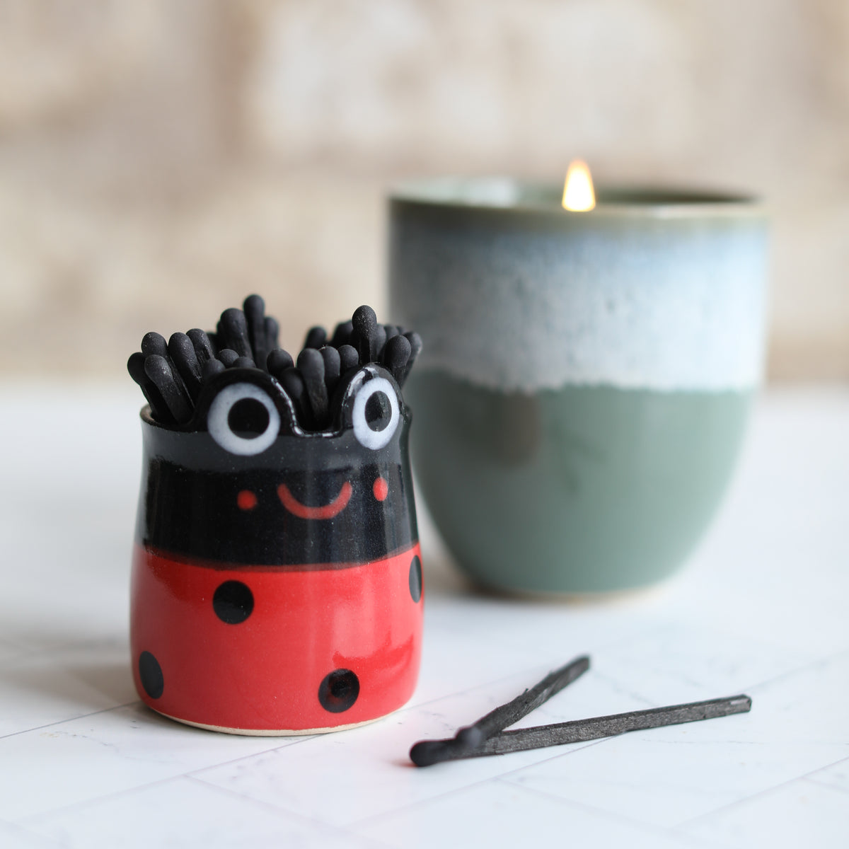 Lady bird pot full of matches.