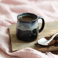 A black espresso cup from Glosters. 